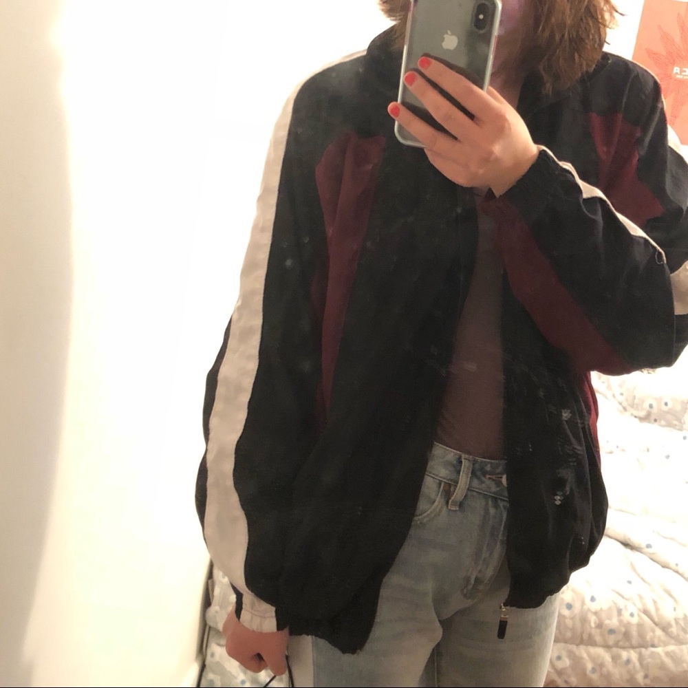 Black white and maroon windbreaker